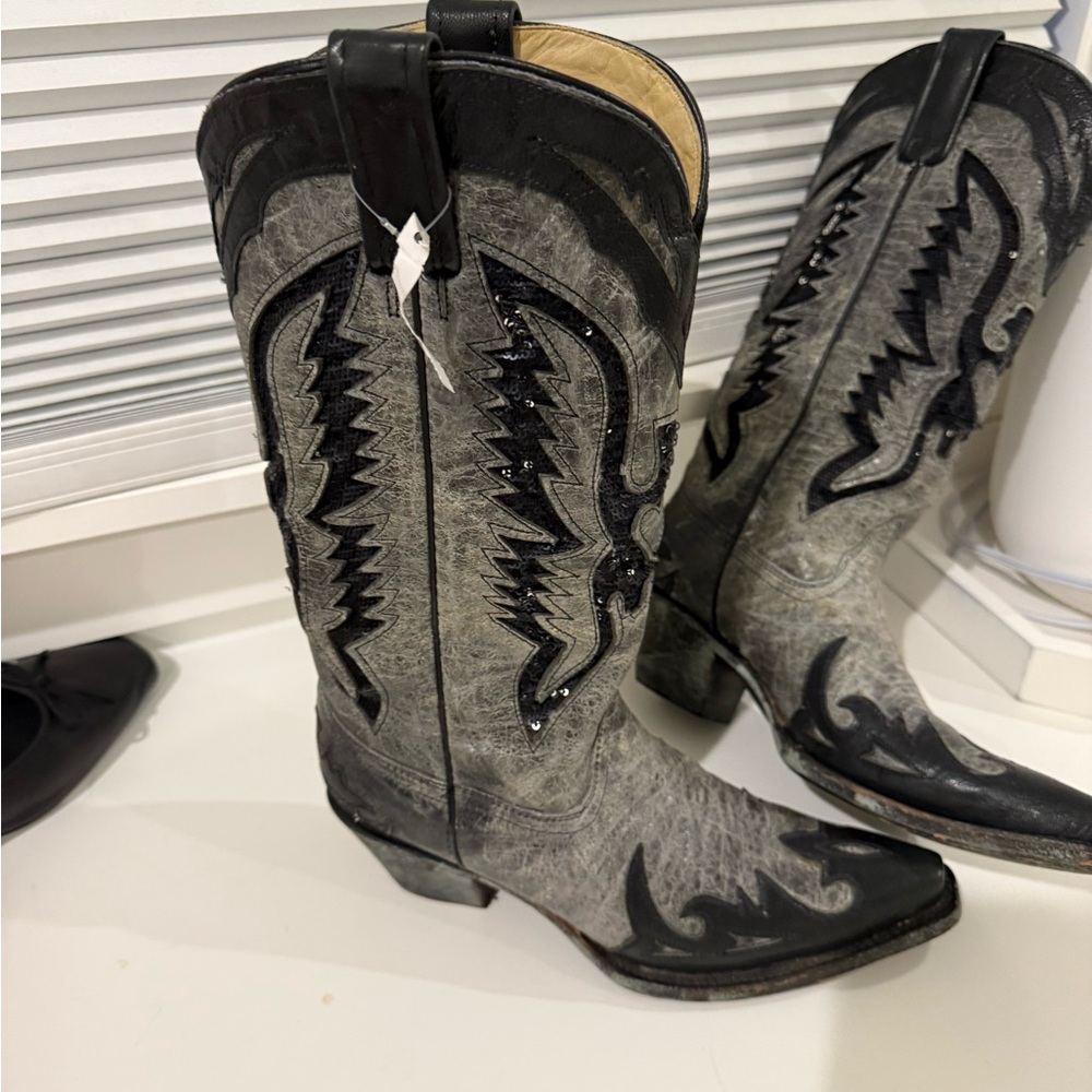 Black and Gray Heeled Boots with Intricate Stitching